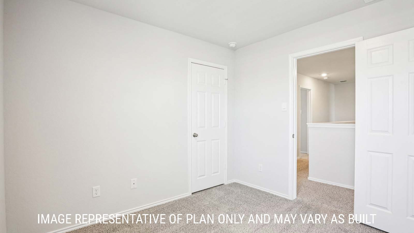 Franklin secondary bedroom with carpeted flooring and view of hallway.