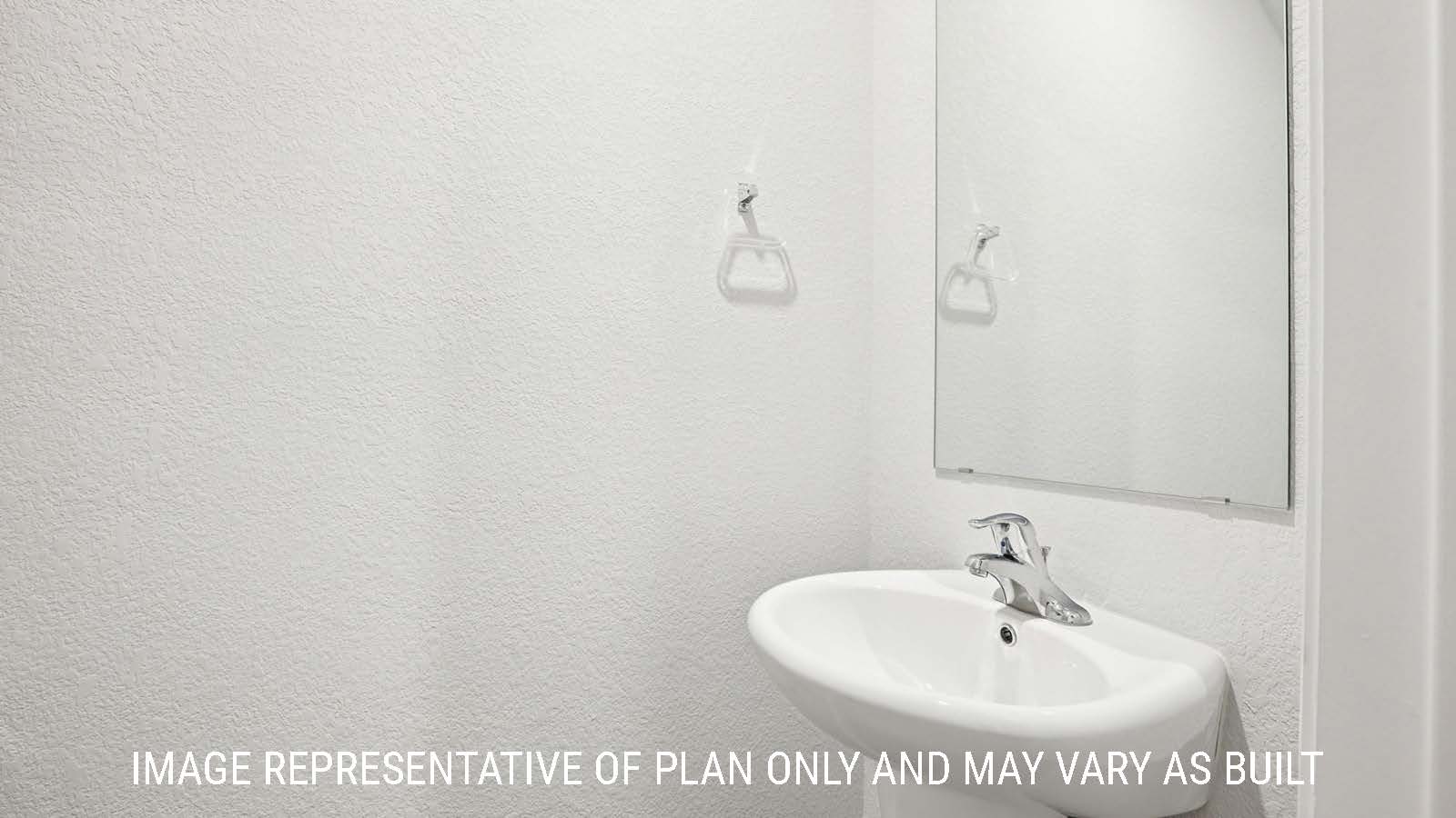 Franklin half bath with sink and mirror.