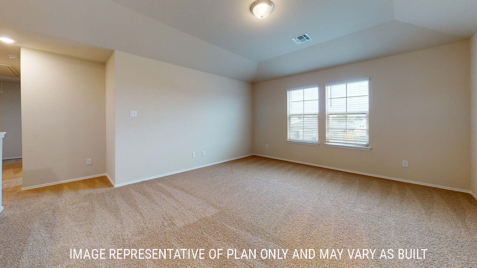 Perry game room with carpted flooring and windows for natural lighting.