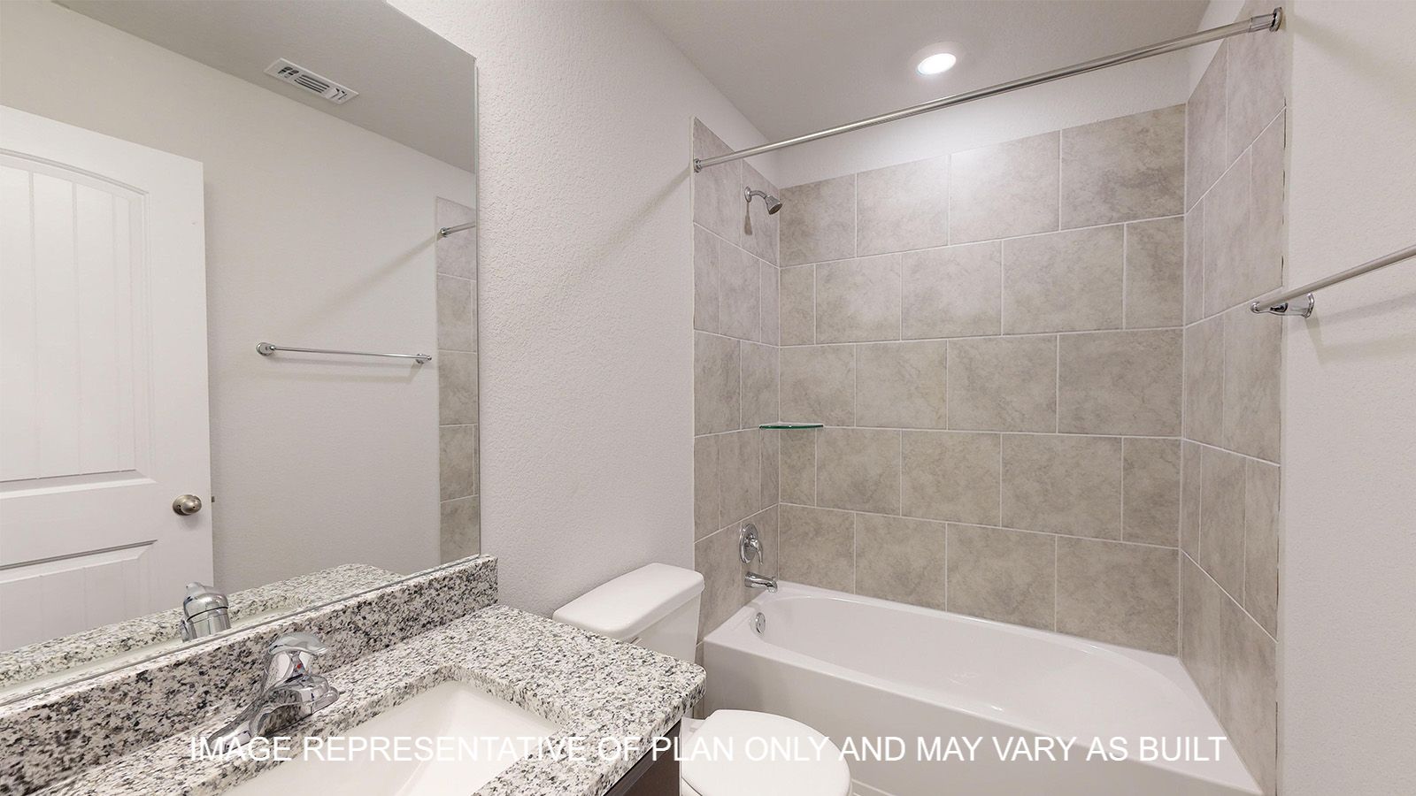 Alpine secondary bathroom with tub and shower combination and ceramic tile surround.
