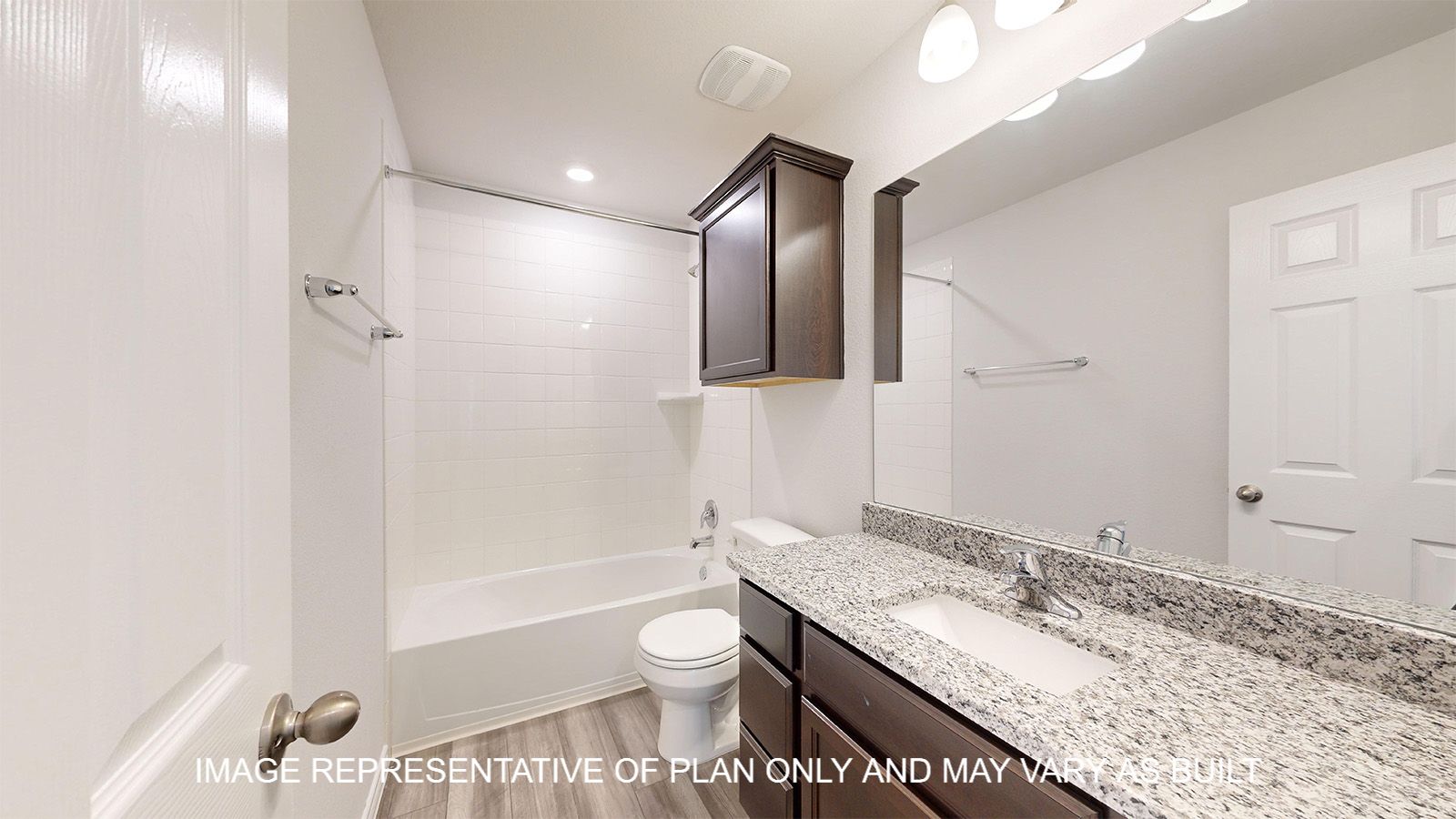 Dakota secondary bathroom with tub and shower combination and single vanity.