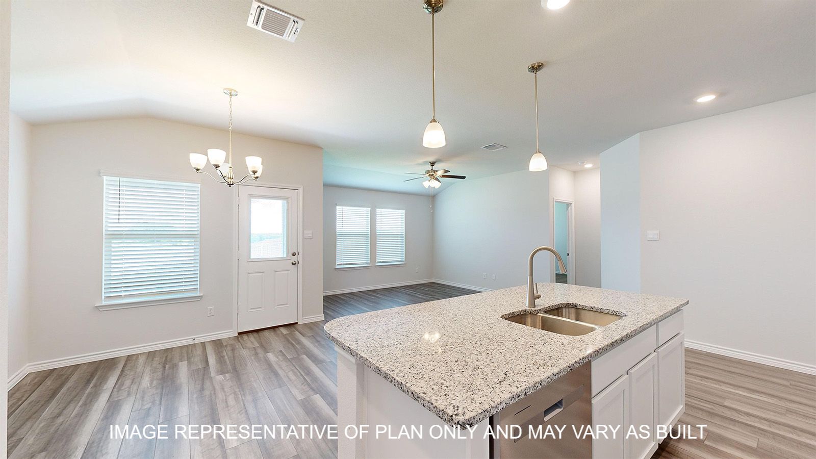 Dakota open concept kitchen and living and dining areas with vinyl plank flooring throughout.