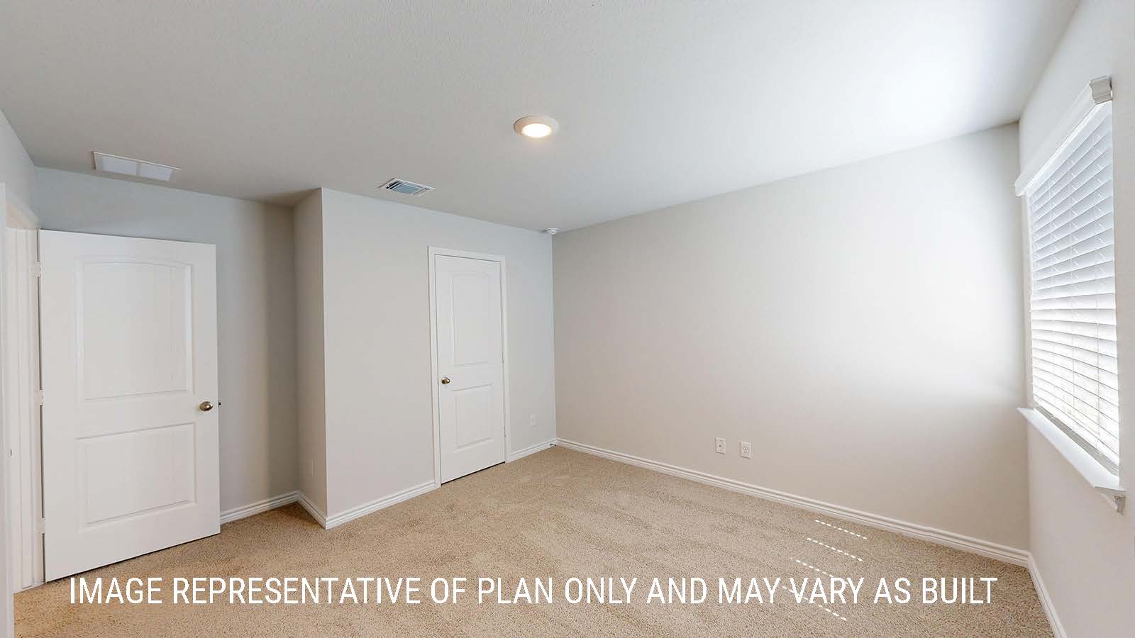 Sonoma secondary bedroom with carpeted flooring and window for lighting.