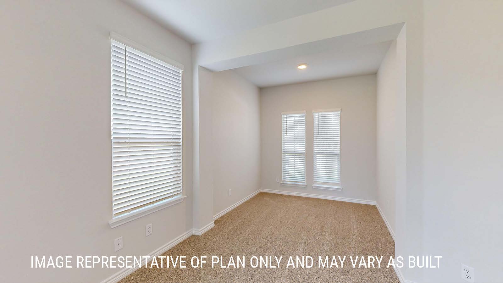 Sonoma primary bedroom with carpeted flooring and windows for lighting.