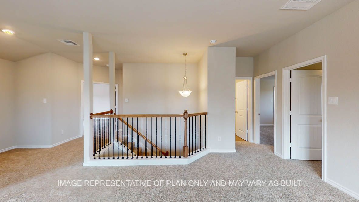 Kiawa game room with half wall railing to the stairs.