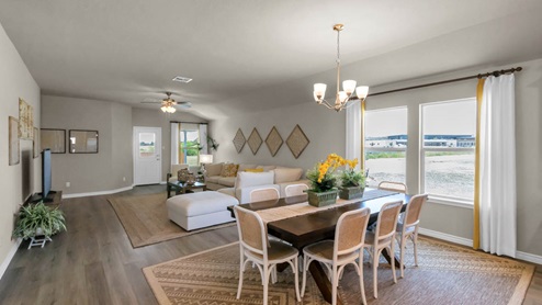 Warrior's Legacy model home dining room with view of the living room.