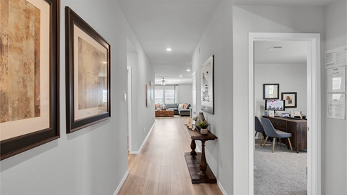 Lake Pointe Terrace front entry way with view of hallway and living room.