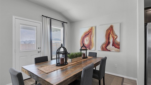Lake Pointe Terrace open concept dining room with view of backyard.