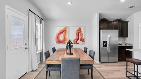 Lake Pointe Terrace open concept dining room with view of backyard.