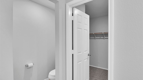 Lake Pointe Terrace primary bathroom with view of primary walk-in closet.