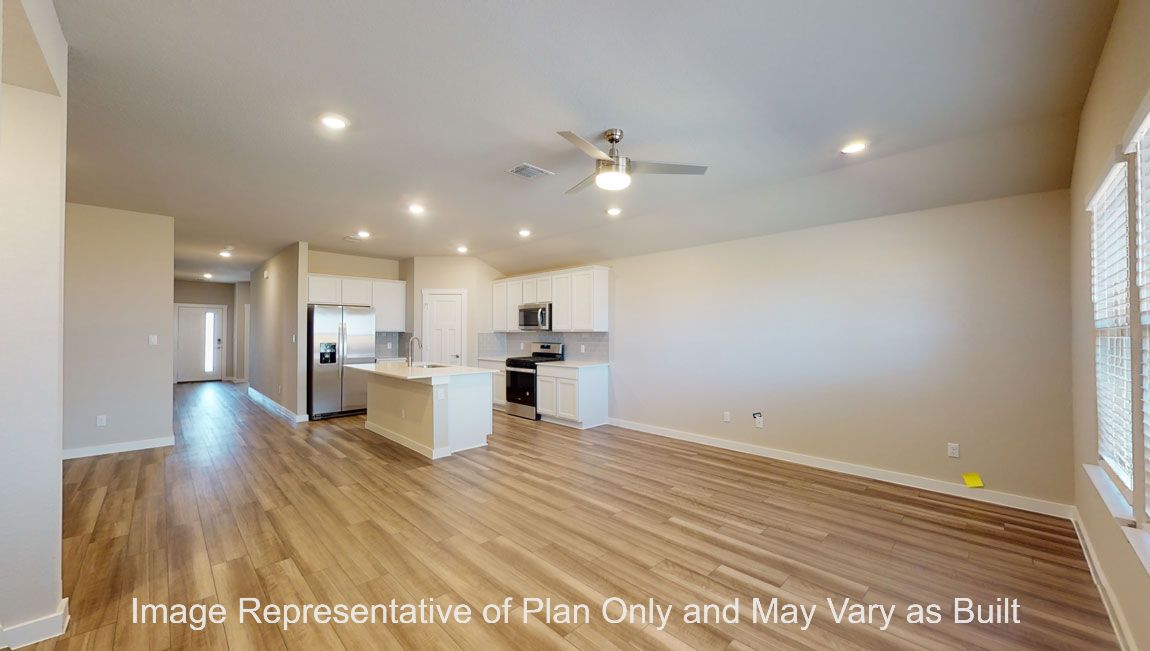 Harris dining with view to kitchen and living room.