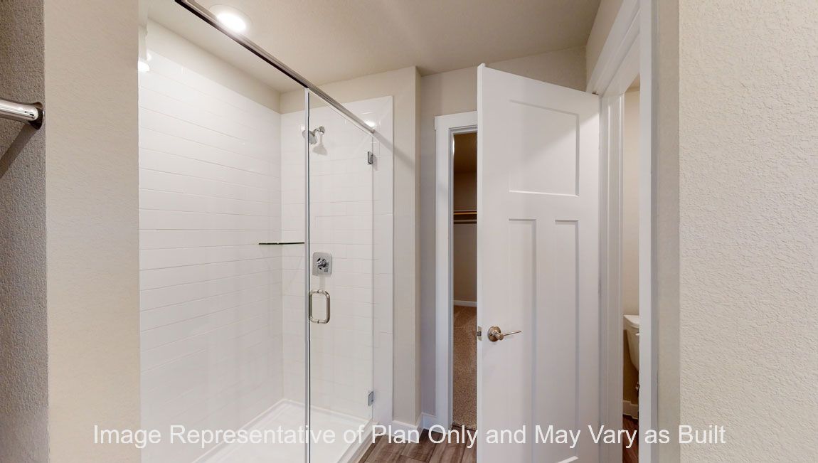 Harris primary bath with clear shower glass enclosure.