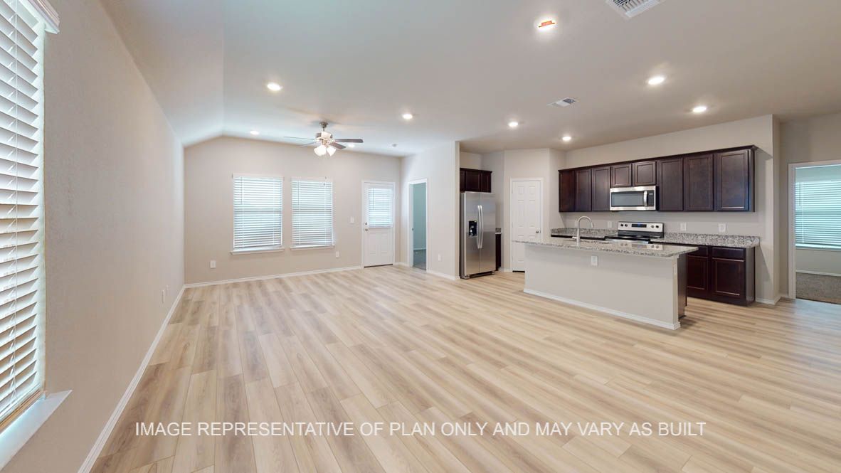 Camden entry with view into open concept kitchen and living areas.