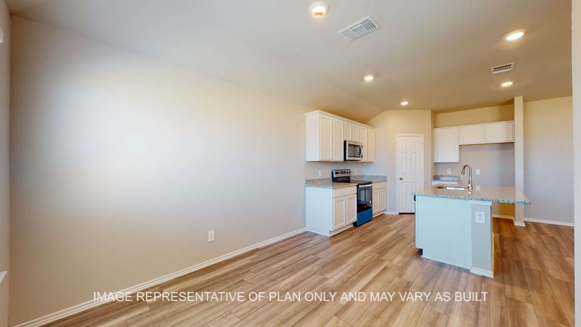 Fargo dining room with view into open concept kitchen.