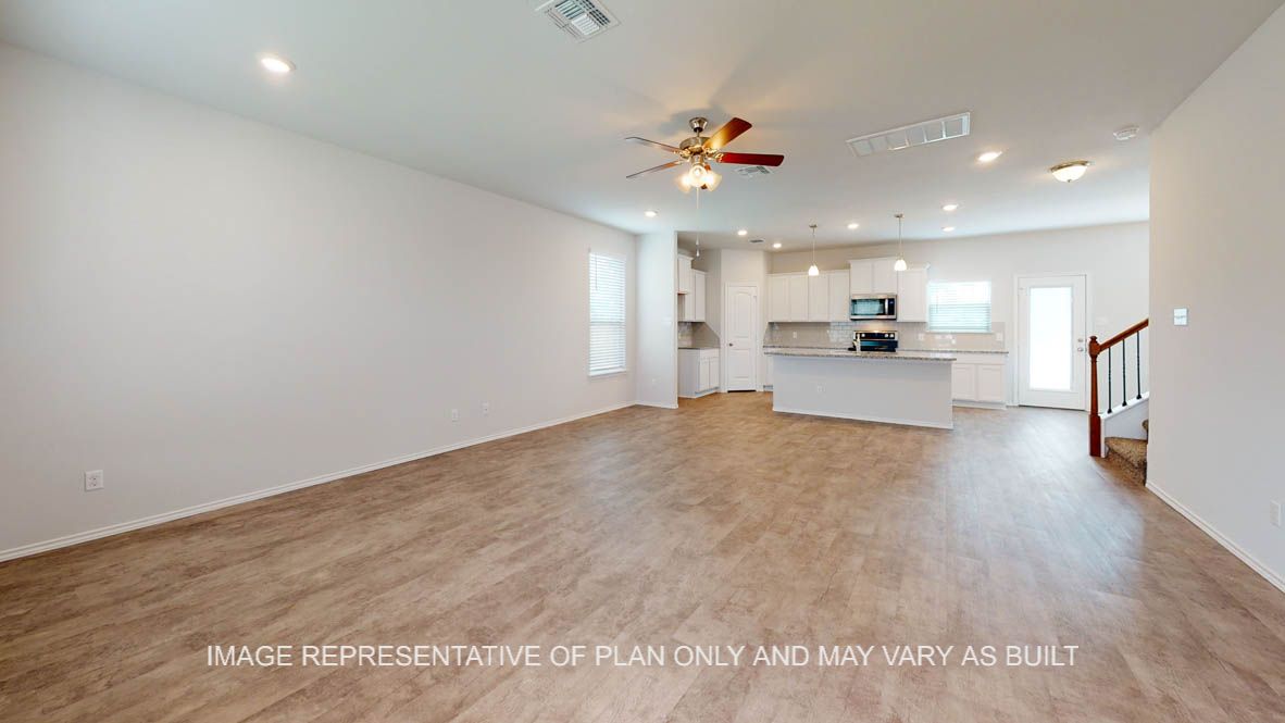 Aspen open concept living area with view to kitchen.