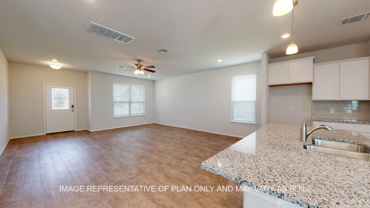 Aspen open concept living area with view to kitchen.