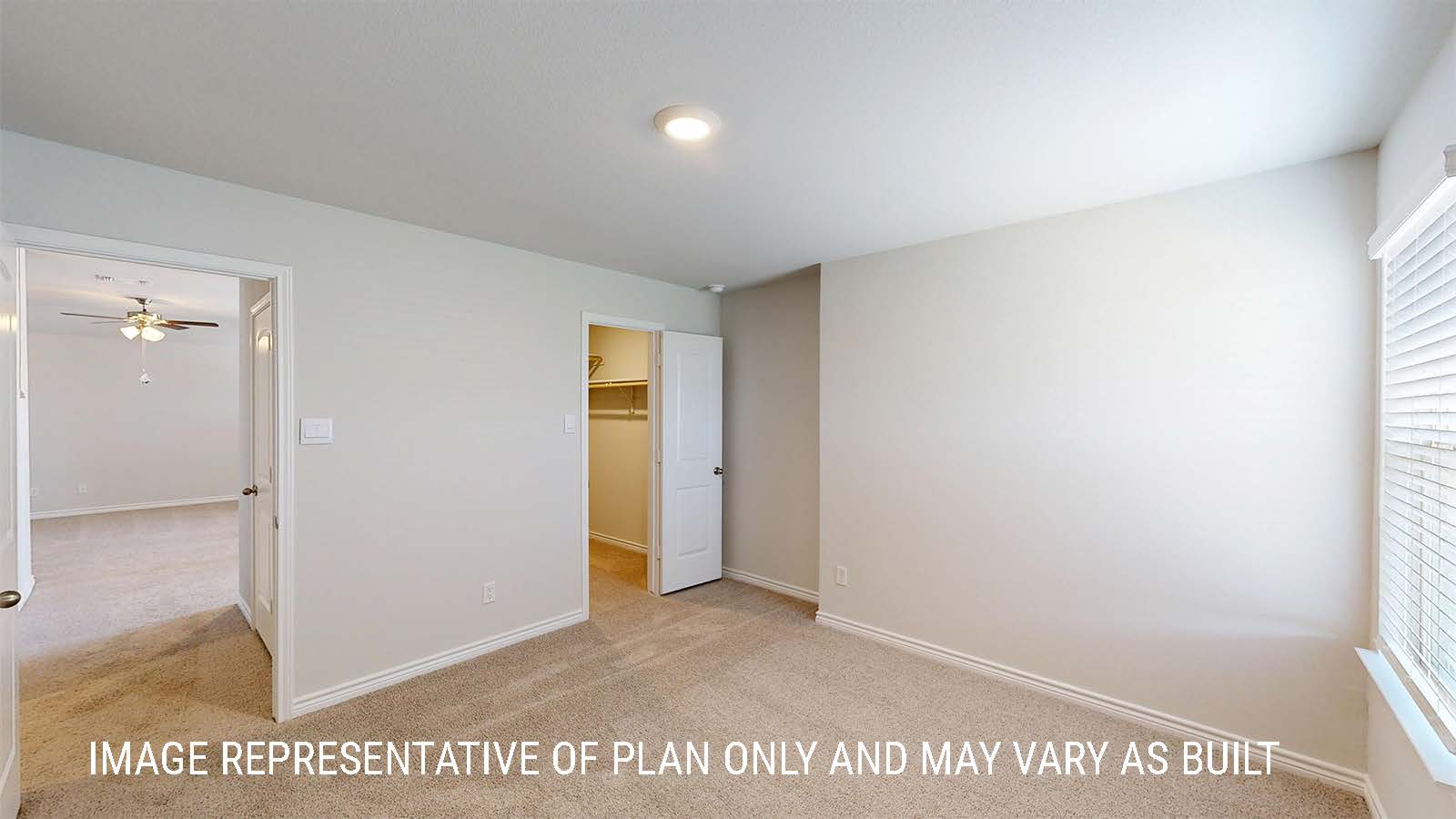 Sonoma secondary bedroom with carpeted flooring and window for lighting.