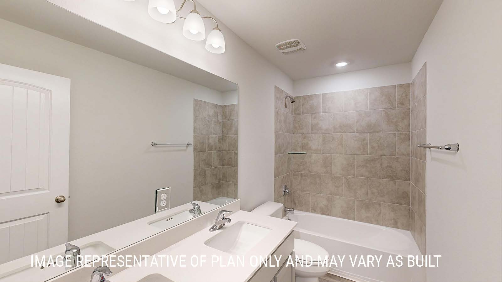 Sonoma secondary bathroom with duel vanity sink and shower and tub combo.
