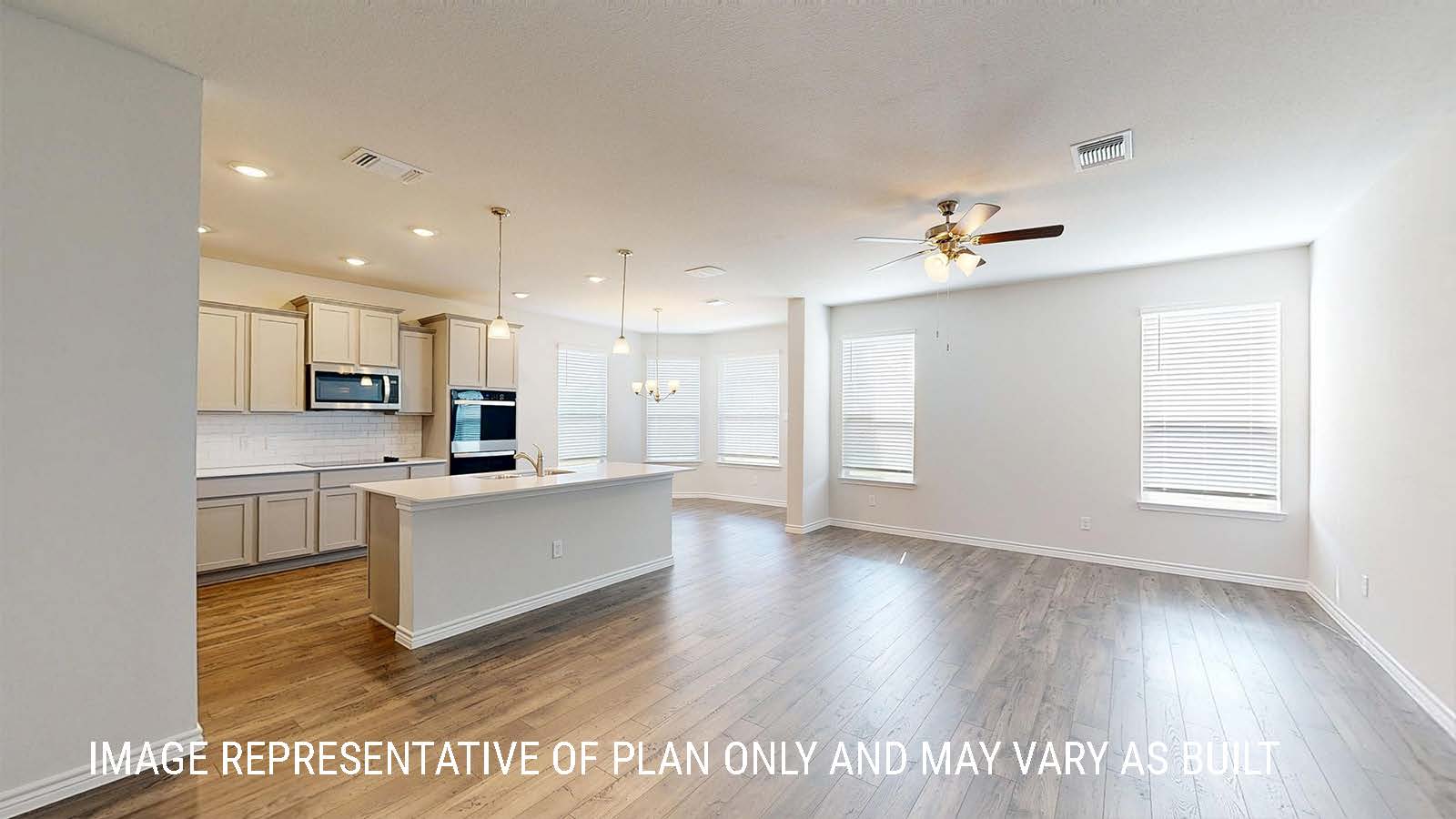 Sonoma living room with view of open concept dining room and kitchen.