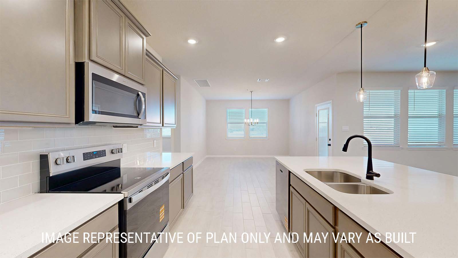 Parker II kitchen center kitchen island with granite countertops and dark cabinets.