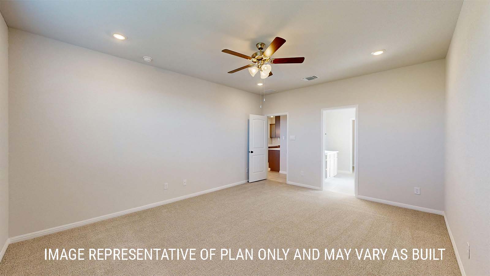Parker II primary bedroom with carpeted flooring and view of primary bathroom.