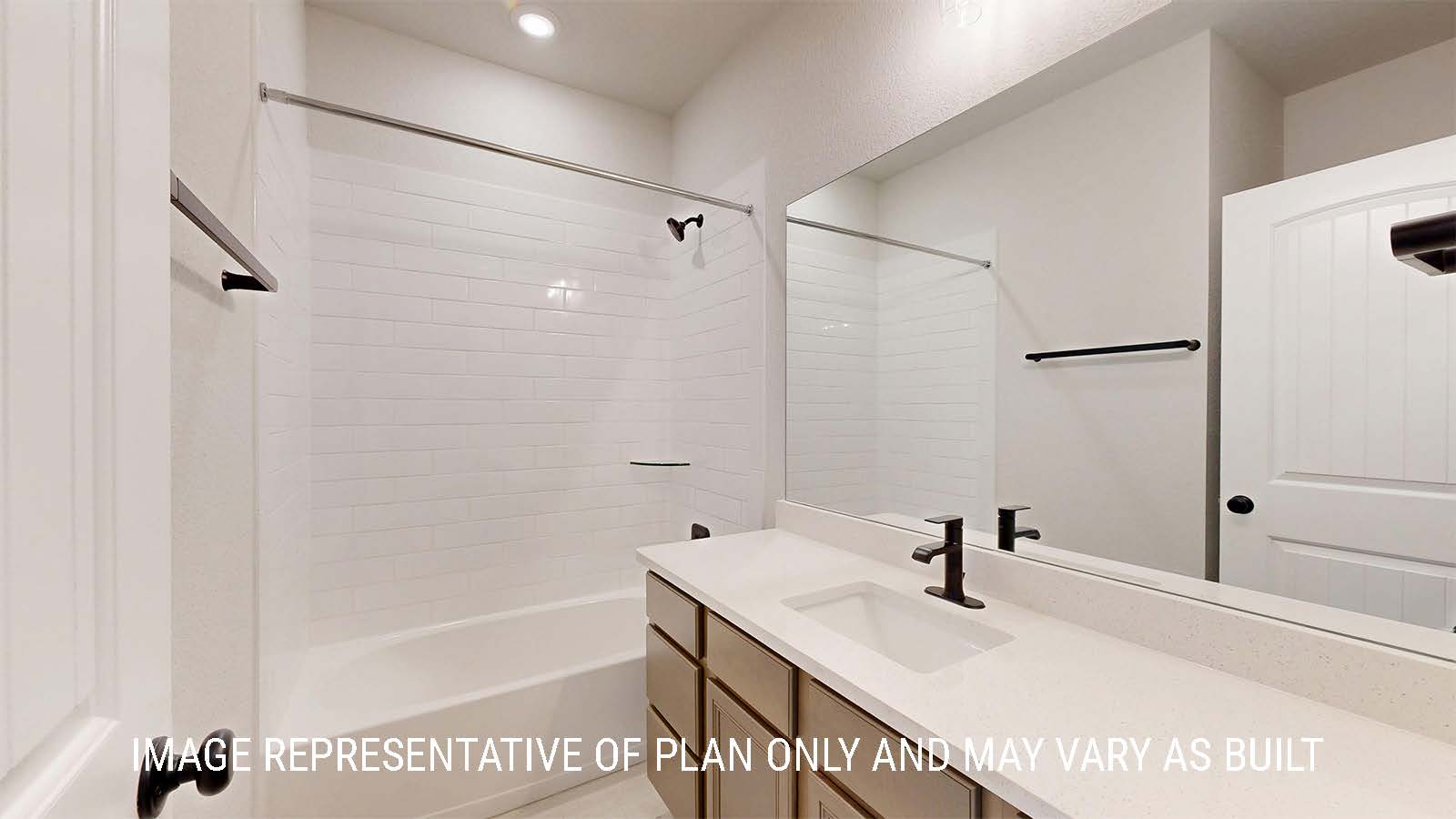 Parker II secondary bathroom with single vanity and shower and tub combo.