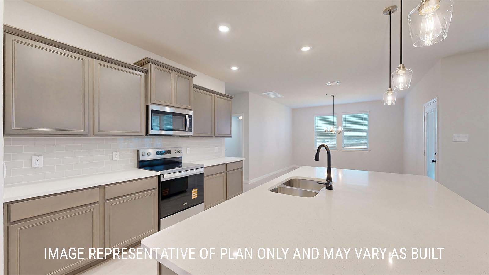 Parker II kitchen center kitchen island with granite countertops and dark cabinets.