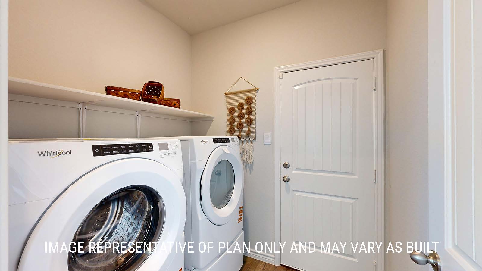 Newburgh utility with washer and dryer and shelving for storage.