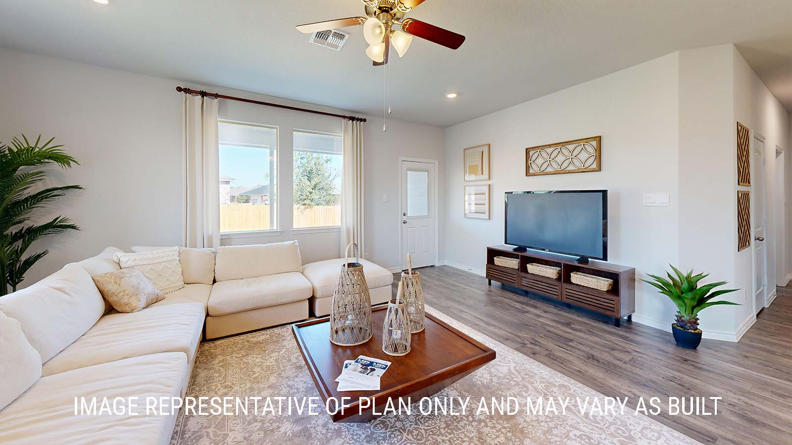 Newburgh living room with windows for lighting and view of back yard.
