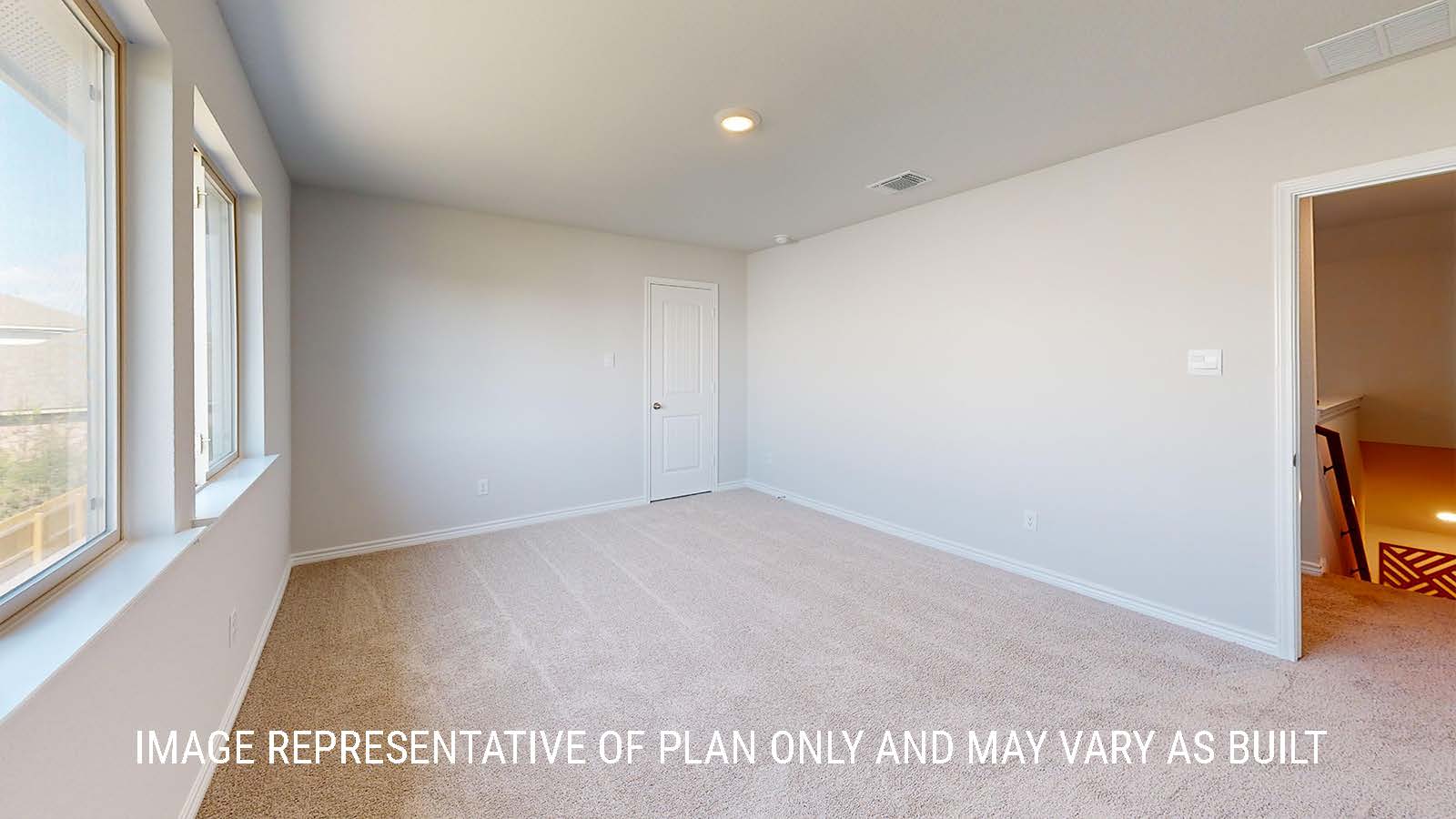 Newburgh secondary bedroom with carpeted flooring and window for lighting.
