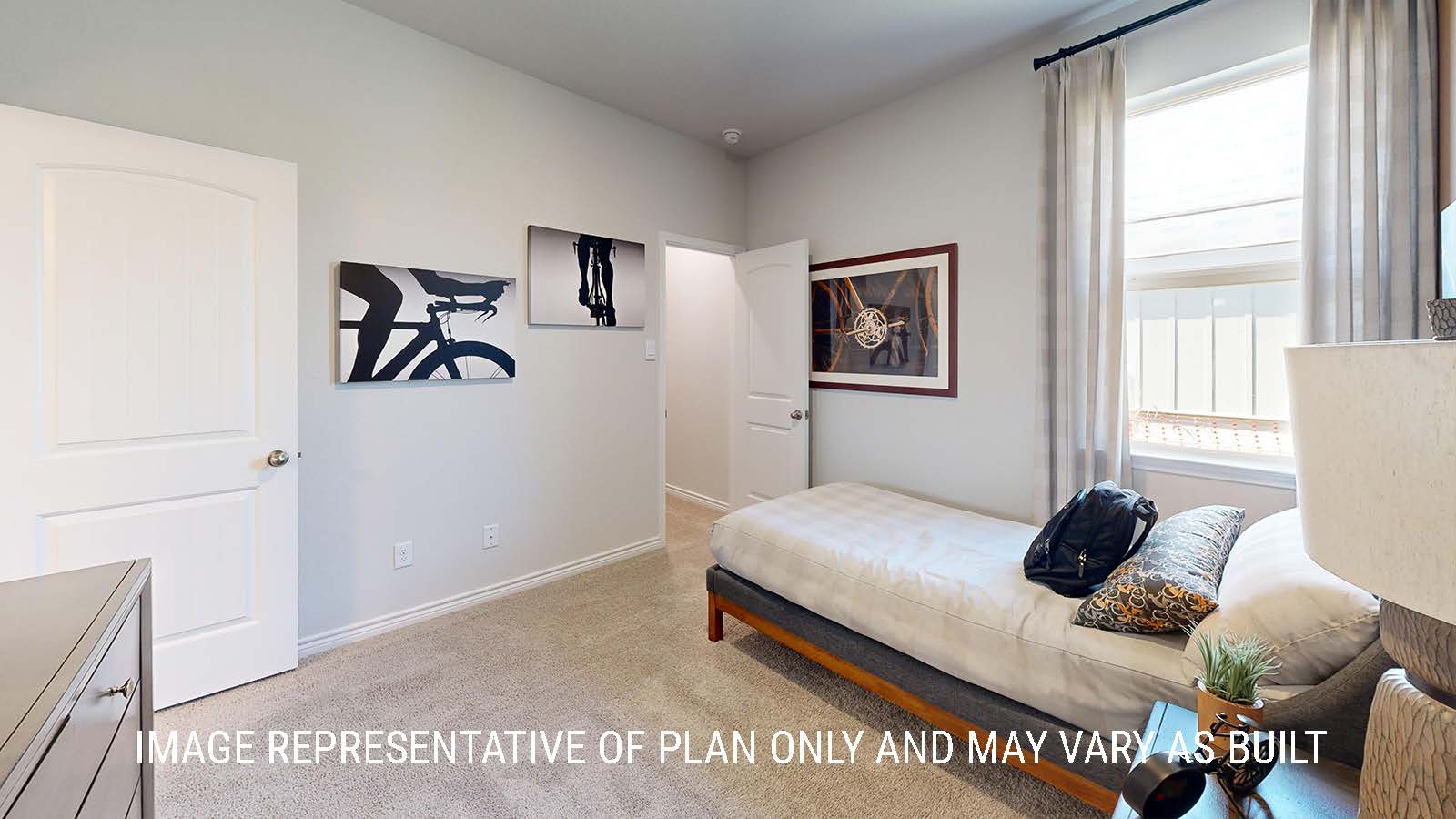Newburgh secondary bedroom with carpeted flooring and window for lighting.