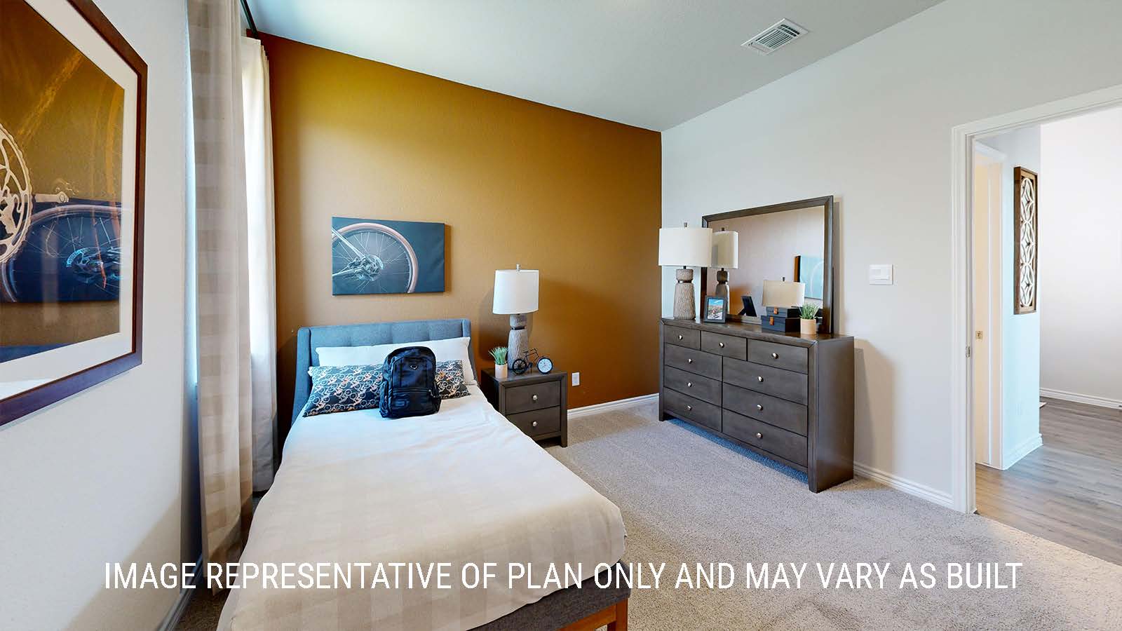 Newburgh secondary bedroom with carpeted flooring and window for lighting.