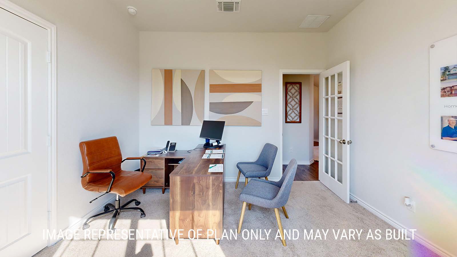 Newburgh office with carpeted flooring and view of entry way hallway.