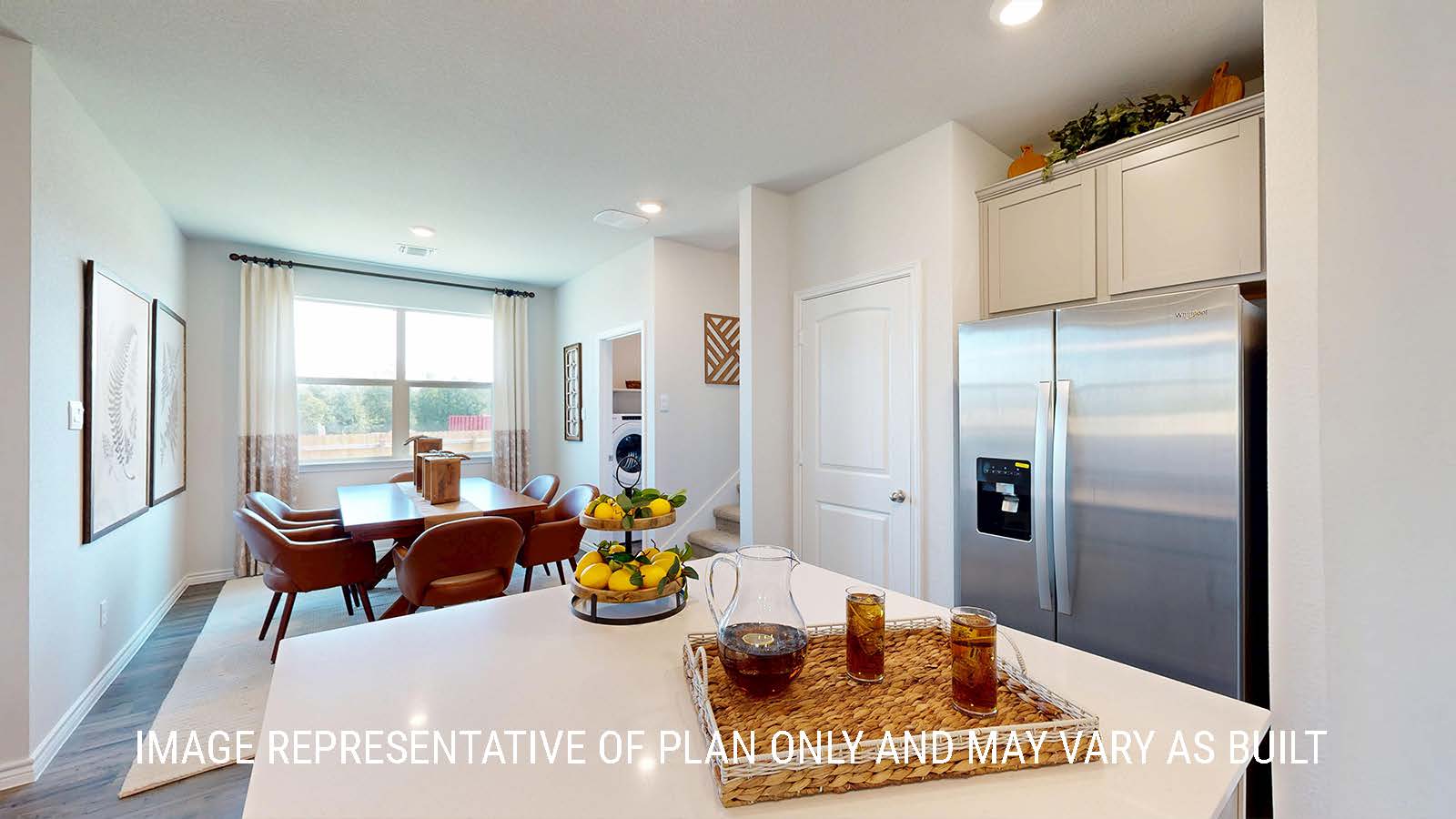 Newburgh kitchen with center kitchen island and view dining room.