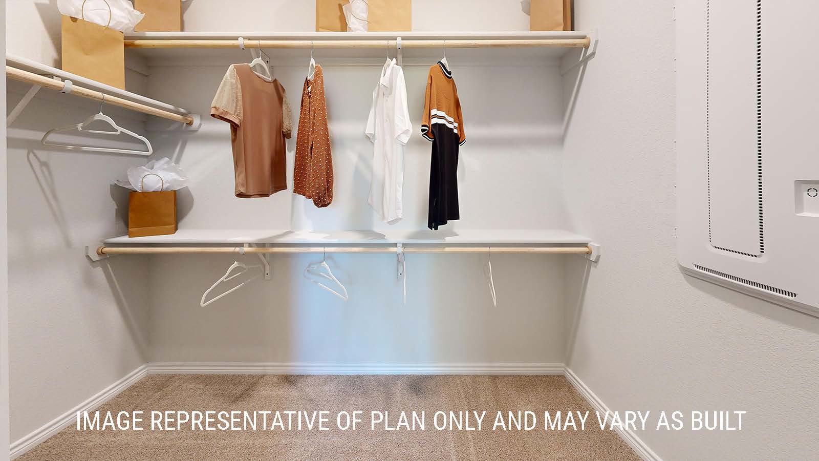 Newburgh primary bathroom with garden tub and walk-in shower.