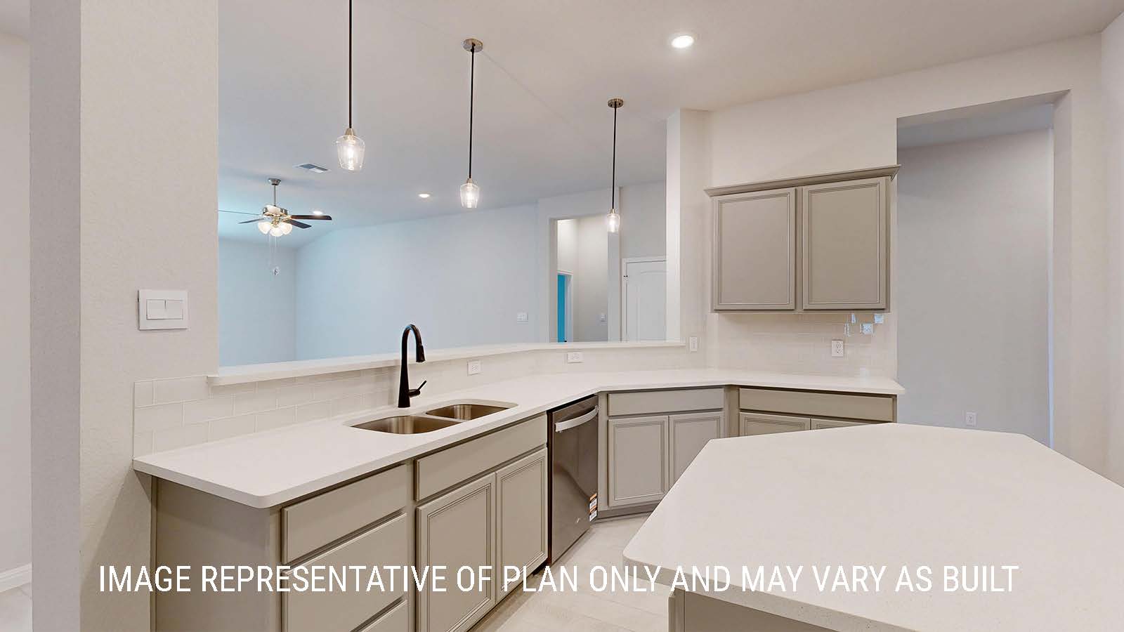 Waverley kitchen with center kitchen island with light cabinets and granite countertops.