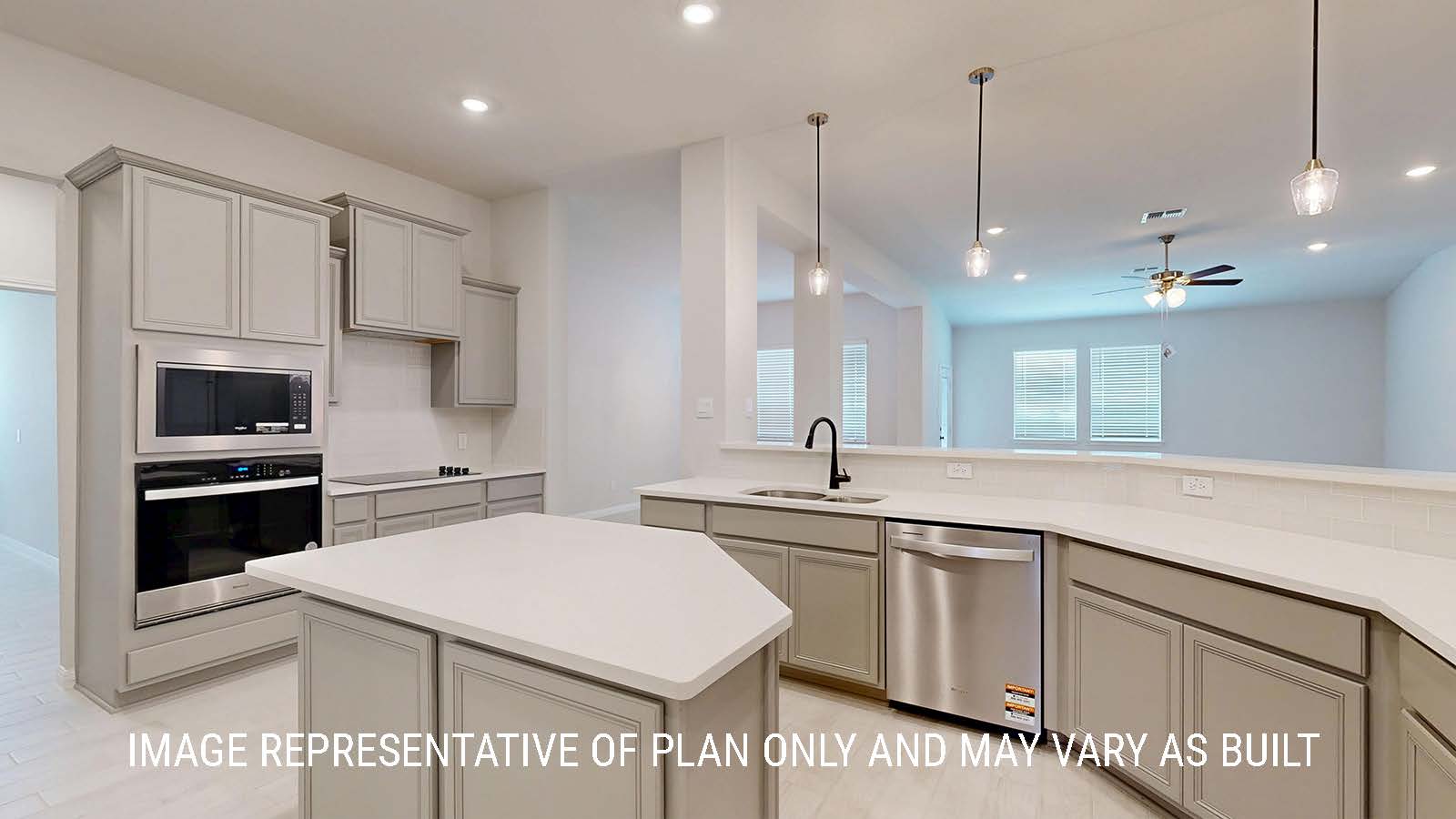 Waverley kitchen with center kitchen island with light cabinets and granite countertops.