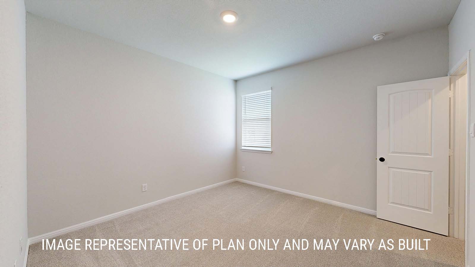 Waverley secondary bedroom with carpeted flooring and window for lighting.