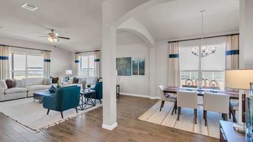Sterling Meadows model home hallway entry with a view of the living and dining room.