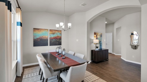 Sterling Meadows model home dining room with a view of the front door.