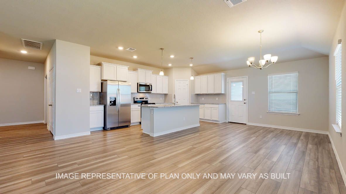 Elmwood dining room open to kitchen and living room.