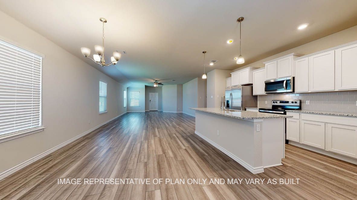 Elmwood dining room open to kitchen and living room.