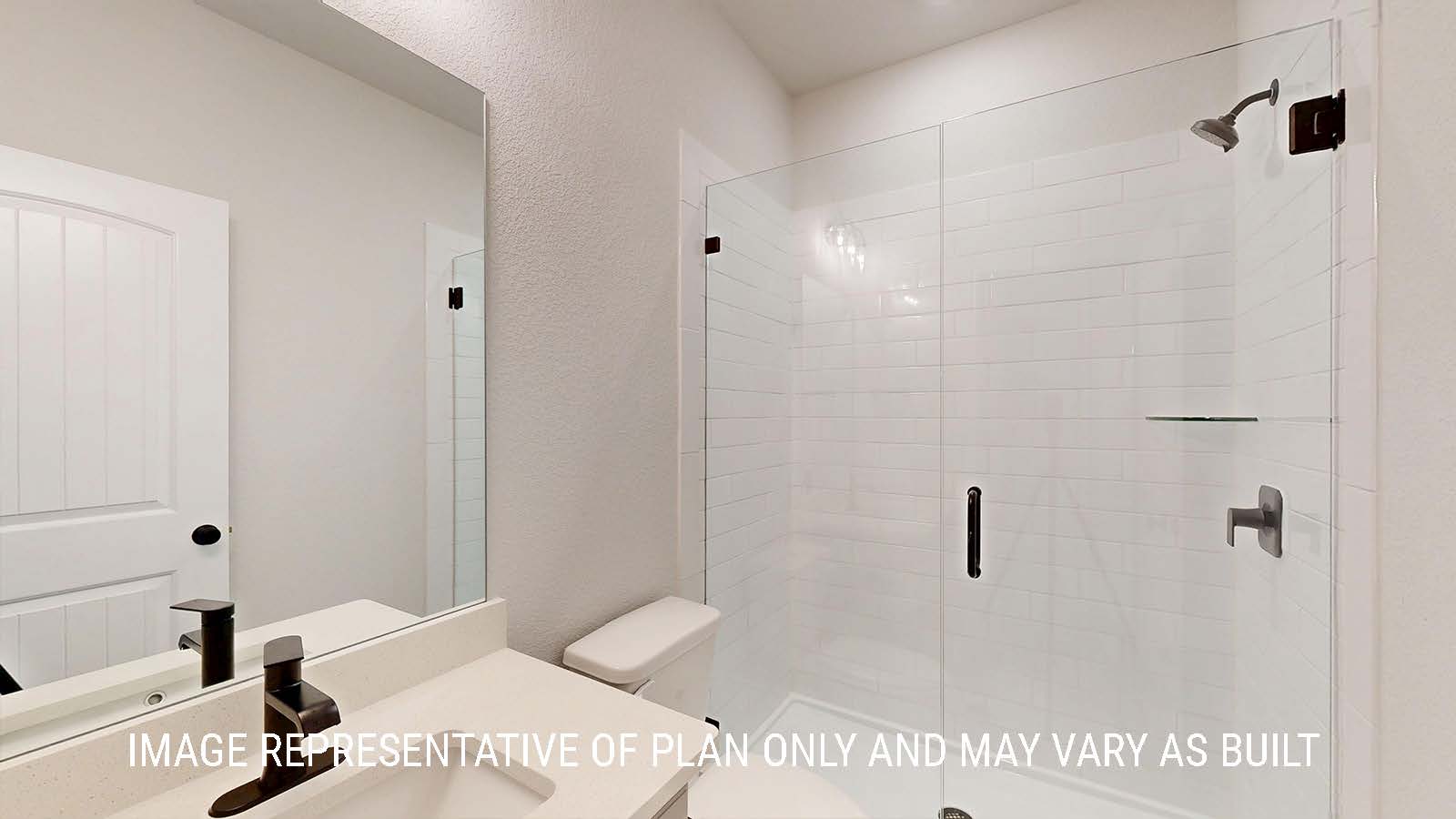 Waverley secondary bathroom with vanity sink and walk-in shower.