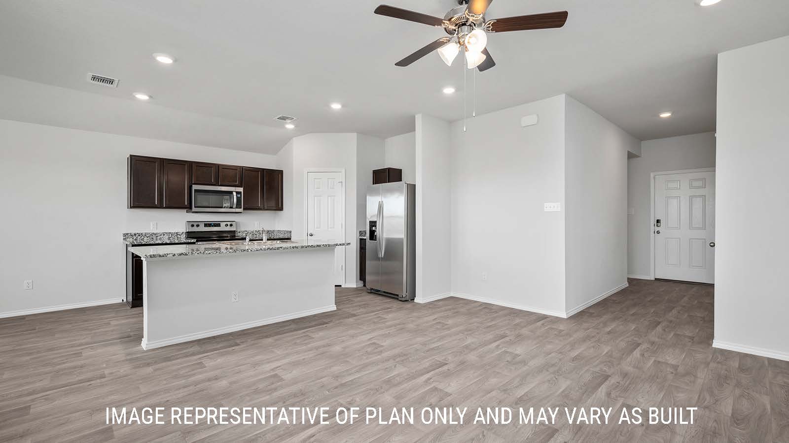 Ashburn living room with view of kitchen island with granite countertops.