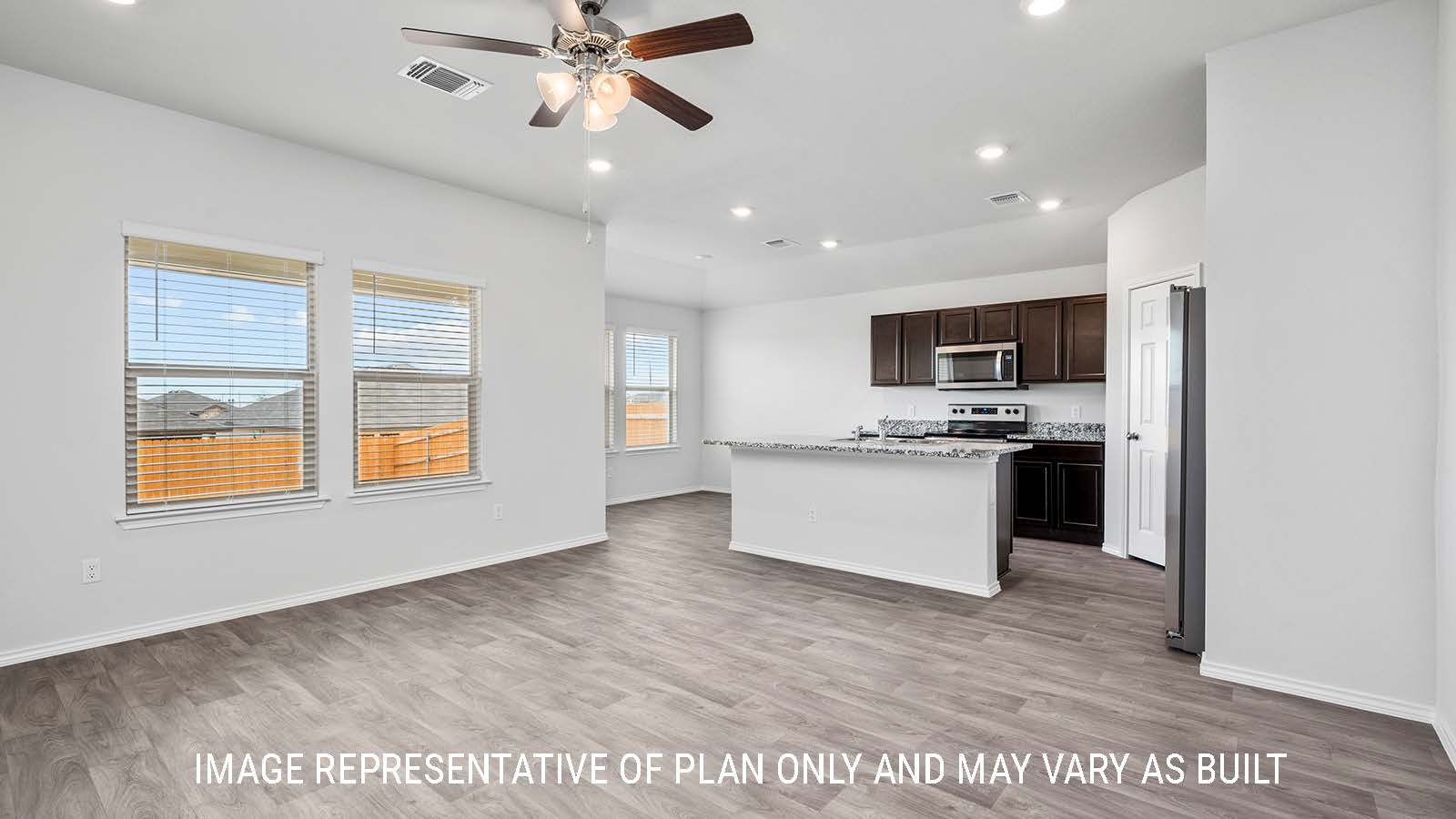 Ashburn living room with view of kitchen island with granite countertops.