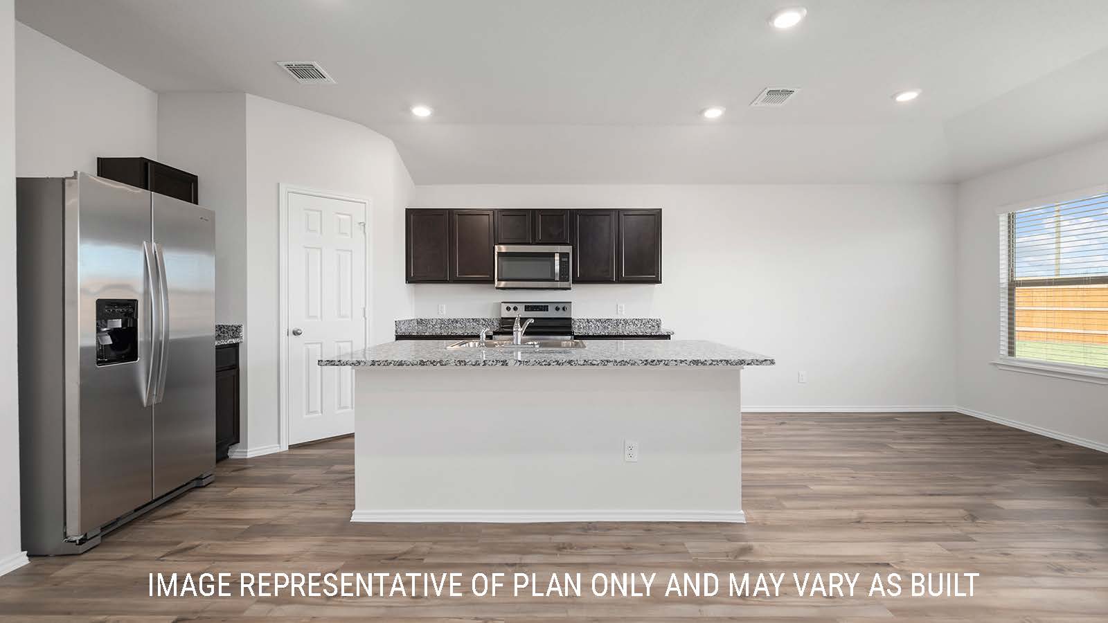 Bellvue living room with view of the kitchen with a center kitchen island.