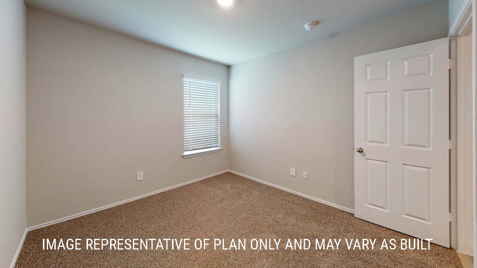 Camden secondary bedroom with windows and carpeted flooring.