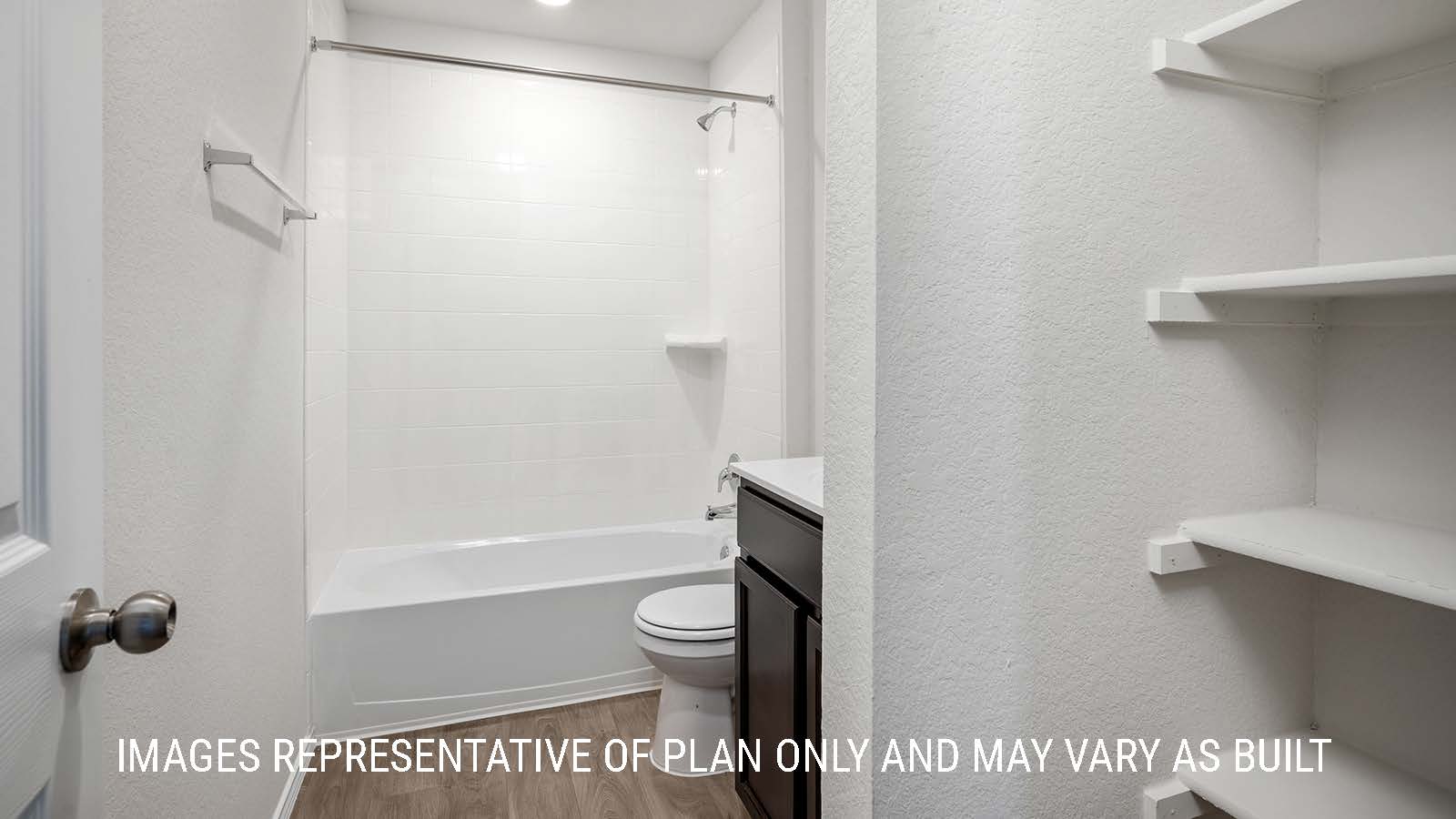 Fargo secondary bathroom with single vanity sink and shower and tub combo.