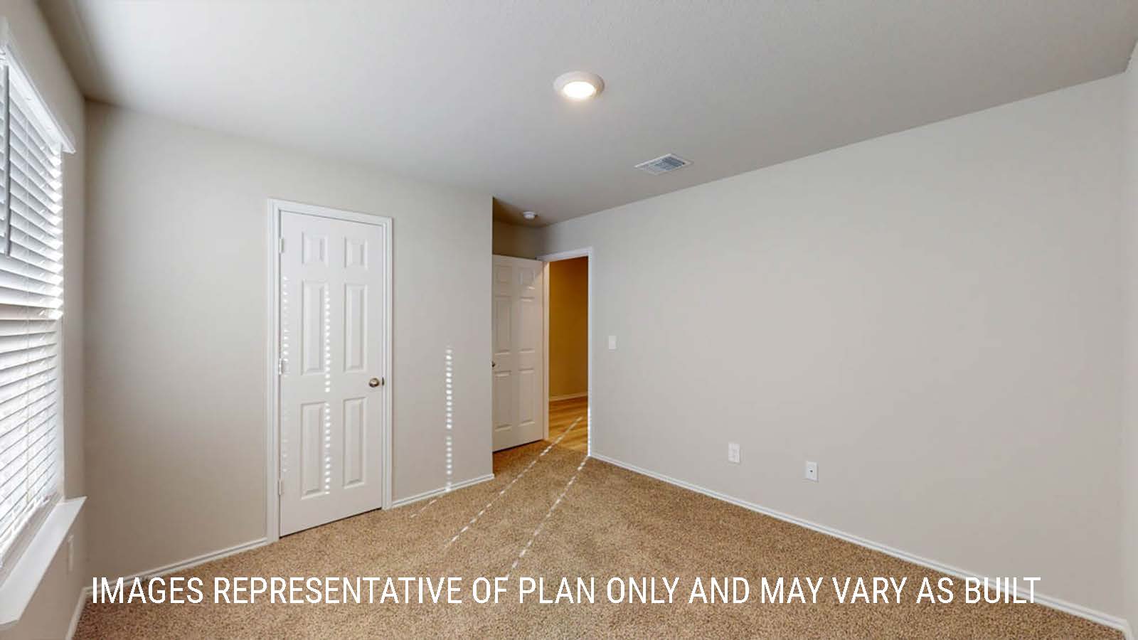 Texas Cali secondary bedroom with closet and carpeted flooring.