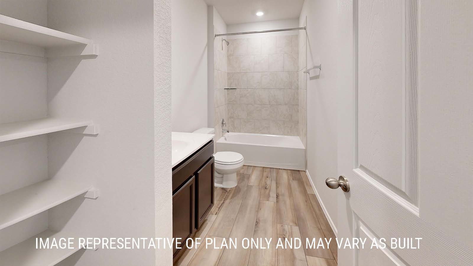 Seabrook secondary bathroom with single vanity sink and shower and tub combo.